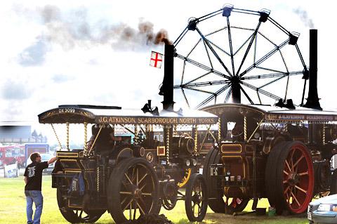 The showman engines and the fairground wheel at the Pickering Traction Engine Rally