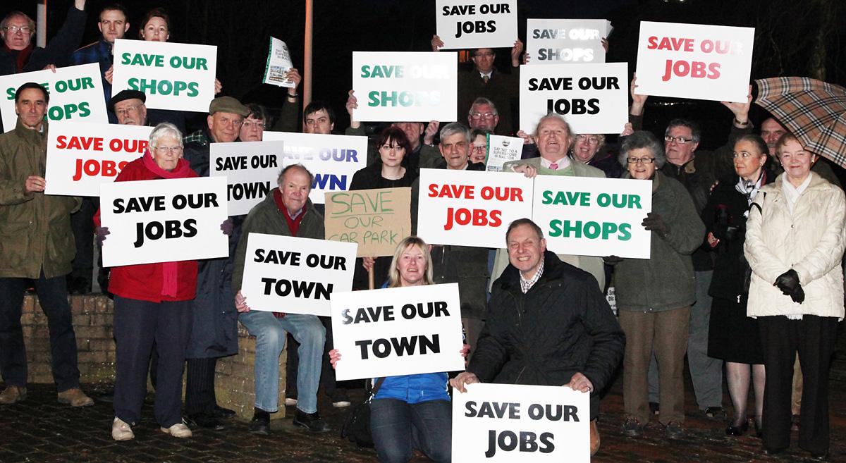 Malton and Norton Town councillors, shopkeepers and residents, protest against the Wentworth Street car park supermarket proposals outside a full meeting of Ryedale District Council.