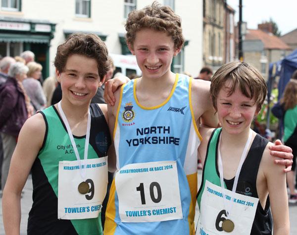 Thirteen year old Nathan Smith who won the 4k Teen race at Kirkbymoorside, centre, with Eliot Hutchinson, 13, who came second, and Toby Antcliff, 12, who was first in the Year 7s