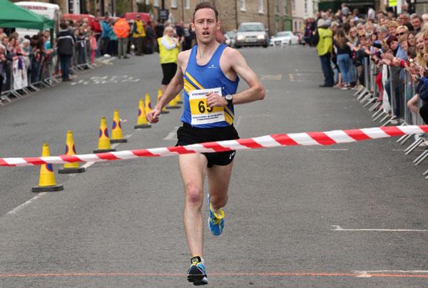 Mike Burrett, 37, of Harrogate, coming in to win the Kirkbymoorside 10k race in 33 minutes and 14 seconds.