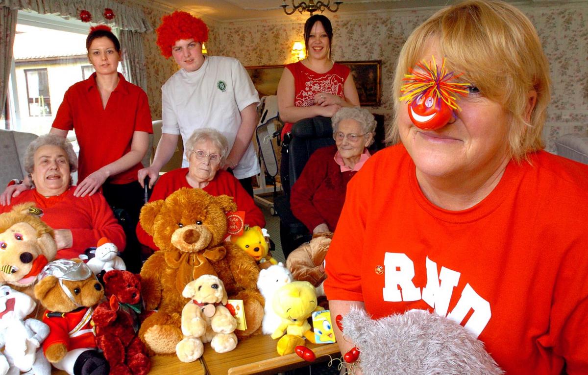 2005: Comic Relief Red Nose Day celebrations. Activities co-ordinator Ros Breuer at the Thornton-le-Dale Care Home with (seated from left) residents Jean Steele, Olive Green and Rene Magson. Standing from left are staff Rachael Tock, Chris Sketchley and C