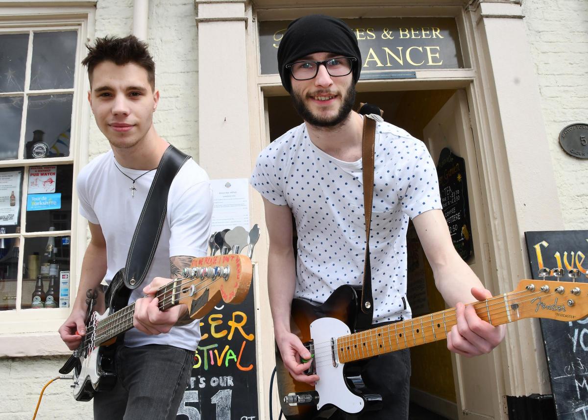 The Tour de Yorkshire in Malton. Pictured outside Suddabys on Wheelgate are Joey Wing and Dec Suddaby of the band Feedback. Picture David Harrison.