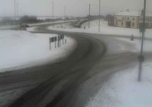 Snow lying at 9.35am on the A165 at Reighton, near Filey Image from North Yorkshire County Council webcam
