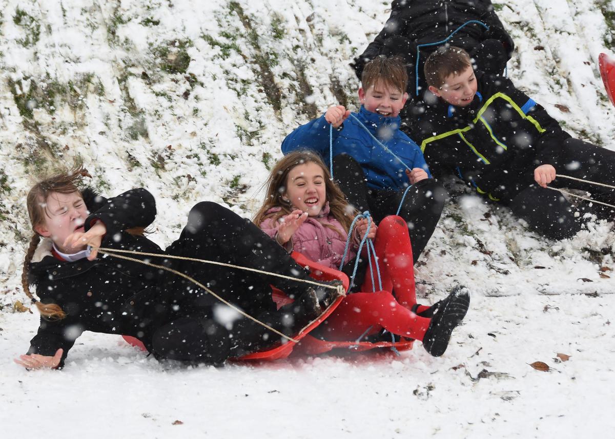 Pictured at Pickering Junior School on Thursday morning are pupils enjoying the snow. Picture David Harrison.