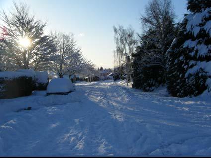 Kirkbymoorside in the snow by Malcolm Richardson.