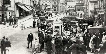 A typical market scene at Pickering in the early 1930s. Longster's van from Malton can be seen across the road from the White Swan, in front of which a plough appears to be for sale.