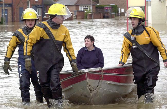 A householder is pulled through the water in Norton