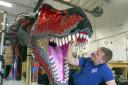 A Lego T-Rex under construction for Marwell Zoo in Hampshire. Picture: Steve Parsons/PA 