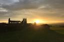 Sun sets behind Whitby Abbey     Picture: Lily Rose Cuthbert