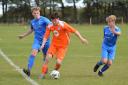 Heslerton’s Morgan Kendrew (orange) opened his account for the season against newcomers Lealholm.