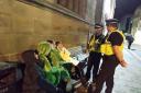'Are you OK, guys?': Project Vigilant police officers talk to a group of young people on a bench in Spurriergate, York