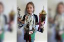 Eight-year-old Tillie has amassed many medals and trophies from her bouts