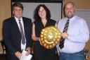 Charles Wrightson awards the Dennis Cobbold shield to Clare Finlinson, Malton & Norton safeguarding officer, and deputy safeguarding officer Ian Hepworth