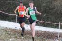 CHAMPION: City of York Athletic Club's Angus McMillan leads Andrew Grant from Harrogate Harriers