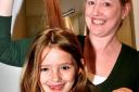 Jasmine Scott, 8, with her mum, Sarah , she  is having her long hair cut to give to children with cancer at Tony & Guys , York  Picture Frank Dwyer.