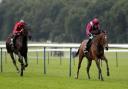 Safe Voyage (right), who is ridden by Jason Hart, in action. Picture: Simon Cooper/PA Wire