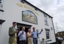 Sir Phillip and Tom Naylor-Leyland visited The Spotted Cow after it reopened last month