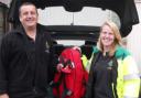 Sarah Herbert and Phil Hanby hand-over the responder kit over as they change duty