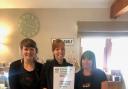 L-to-R Charlotte Corney, Louise Coverdale, and Kerrie Smith with the Travellers Choice certificate