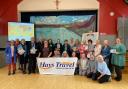 Nick Abbey, Manager from Hays Travel, Pickering, and Rev. Jenny Buckler from St. Peter's Church in Norton,  alongside some of the club helpers