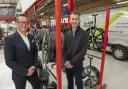 Phil Newstead and Dan Besau of Smart Repairs inside and outside their state-of-the-art premises in Weaver Street, Leeds Image: Supplied