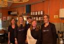 Kate Bottley with team memebrs of York cafe Chocolate & Co
