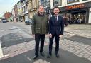 Cllr Andrew Williams, left, and Cllr Keane Duncan in Ripon’s Market Place, where the road will benefit from a full resurfacing scheme as part of next year’s highways capital programme.