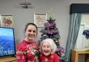 Residents and staff at Rivermead care home helped to make the world a better place by wearing a festival jumper on in aid of Save the Children's annual fundraising event, Christmas Jumper Day