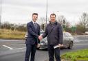 Keane Duncan with roads minister Guy Oppenheim