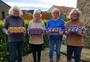 The Crafty Hubbers, based in Thornton Dale, who support various local charities throughout the year hand over the eggs to Foodbank volunteer, Sue Fitter