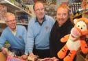 Members of the Ryedale Lions Club Ben Hayes, left, and Vic Hall with Andy Armstrong, right, of the Toy and Book Warehouse, sorting out some of the items which have been donated to the appeal