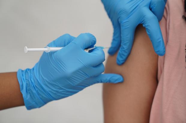 Gazette & Herald: A person getting the vaccine. Credit: PA