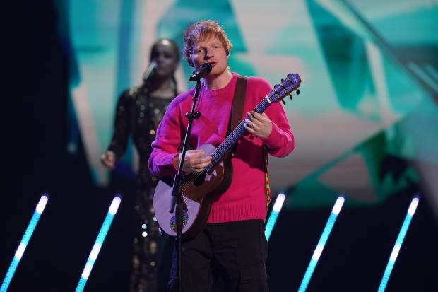 Gazette & Herald: Fans would go wild for the gift of Ed Sheeran tickets. Picture: PA