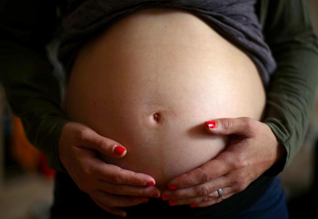 Gazette & Herald: A pregnant woman. Credit: PA