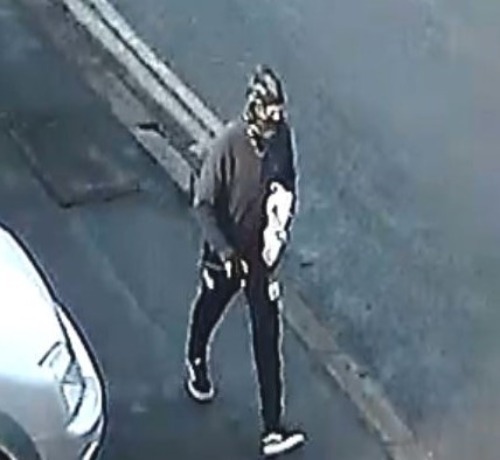 CCTV of Aaron Atkinson walking away after the robbery