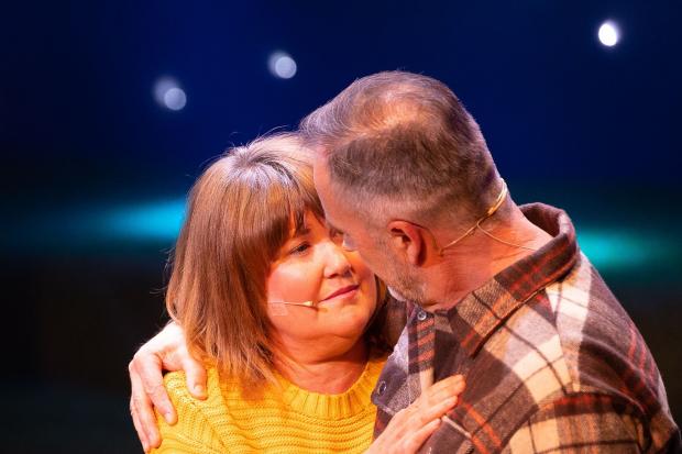 Touching moment: Jo Theaker's Annie and Mick Liversidge's John in York Stage's Calendar Girls The Musical. All pictures: Charlie Kirkpatrick