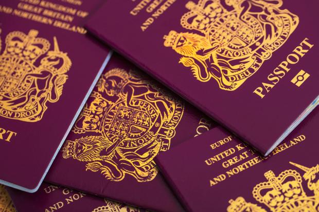 The delay in issuing passports is all part of a cunning Government tactic, says John Walford