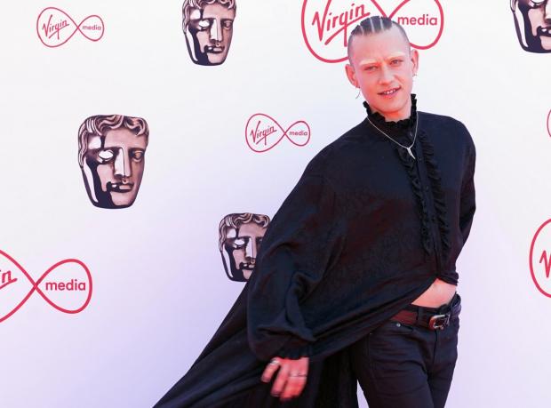 Gazette & Herald: Olly Alexander pictured arriving at the Virgin BAFTA TV Awards 2022. Picture: PA