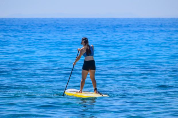 Gazette & Herald: A person paddleboarding (Canva)