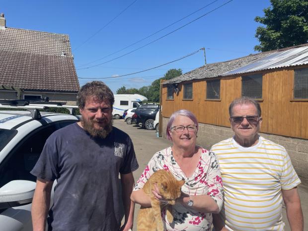 Gazette & Herald: Rob will display the pictures this Sunday (June 26) to celebrate his 40th birthday. Pictured: Rob Temple, Lesley Temple, Geoff Temple, and the family's cat Albert Picture: Dylan Connell