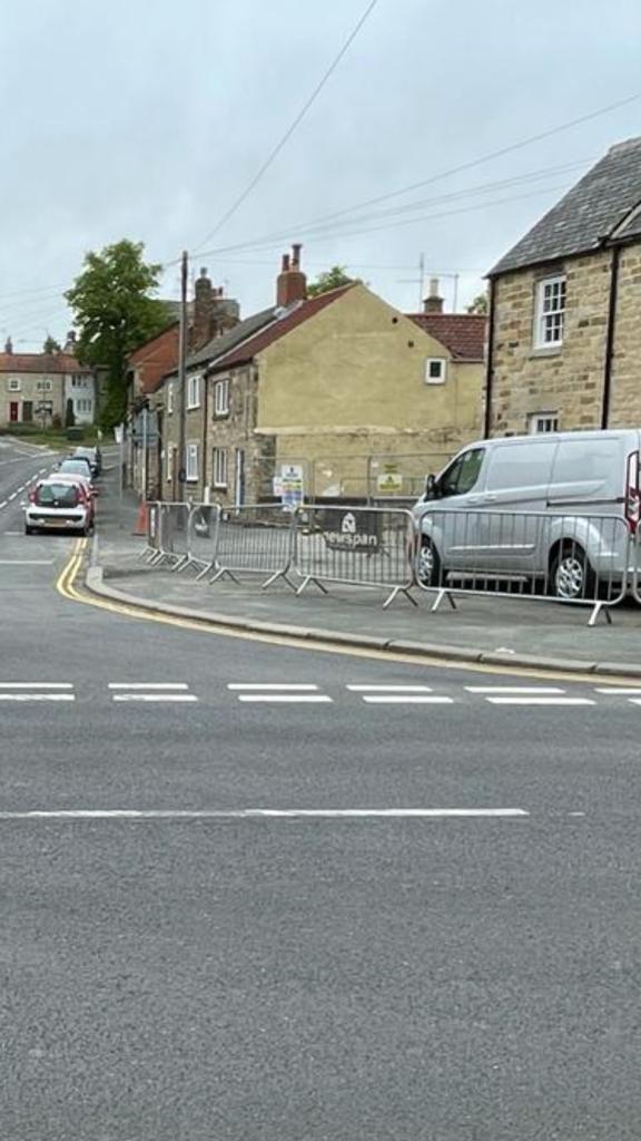 Gazette & Herald: Developers installed a construction barrier as work continued