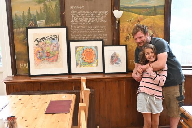Gazette & Herald: Rob Temple pictured with Jessica Greetham, who inspired him to start drawing Picture: Abigail Greetham