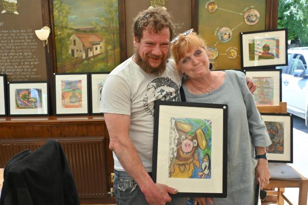 Gazette & Herald: Rob united with his school art teacher Annie Chaddock Picture: Abigail Greetham