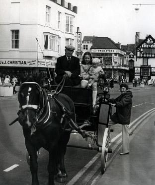 A leisurely way of seeing the sights at Scarborough - riding along the front in a horse-drawn buggy in 1973.