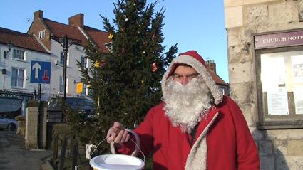 Father Christmas in Malton Market Place, by Nick Fletcher.