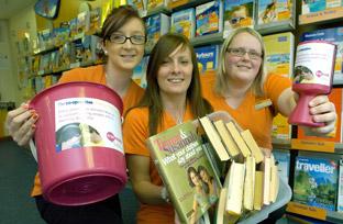 Staff at Co-operative Travel, in Malton, who are selling second-hand books to raise money for Mencap. From left are Melanie Strangeway, Leanne McElroy and Kirsty Rudd. 
