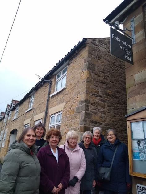 Ebberston and Allerston WI gifts funds to provide village hall sign 