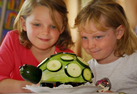 ALEX and Megan Marshall with the cucumber turtle they entered at Rillington and District Horticultural Society’s 88th annual show in Rillington Village Hall on Saturday.