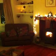 The golden glow of the real fire in Sarah Walker’s last house brought an extra element of festive coziness to Christmas preparations
