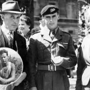 Denis Husband, pictured with his parents Wilfred and Milly at Buckingham Palace in 1954 after receiving the Military Medal for gallantry in the Korean War and (inset) pictured in active service in Korea in 1952